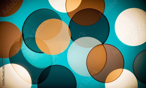 close-up of a colorful abstract pattern of overlapping circles in various shades of blue, brown, and white.