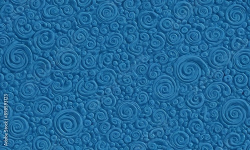 blue background with a repeating pattern of small circles or swirls.