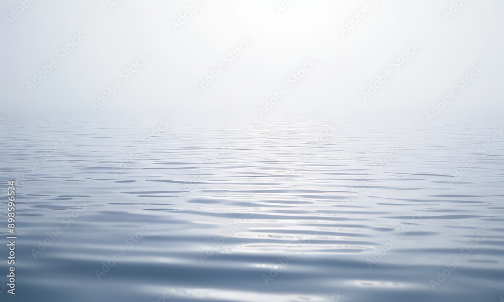 Obraz premium blurred photograph of a body of water with ripples, and the sun is shining brightly in the background.