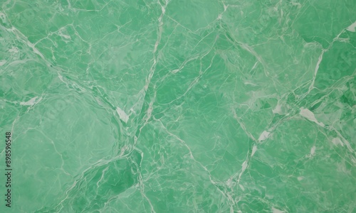 close-up of a green marble surface with visible cracks and fractures. © Nipon