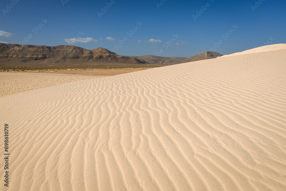 Beautifully formed dunes during sunset captured on Socotra - a unique island with unique plants and landscapes. Beautifully formed dunes during sunset captured on Socotra - a unique island with unique plants and landscapes.