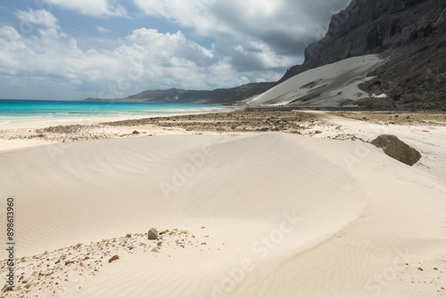 Beautifully formed dunes during sunset captured on Socotra - a unique island with unique plants and landscapes. photo