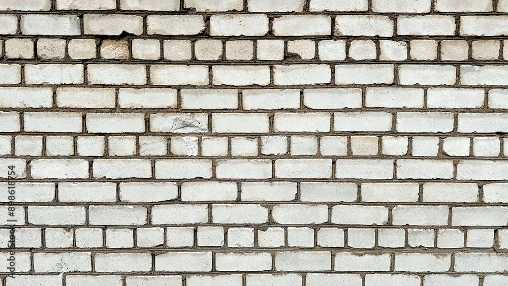 White brick wall texture background. White bricks with black seams surface. White brick wall texture background. White bricks with black seams surface.