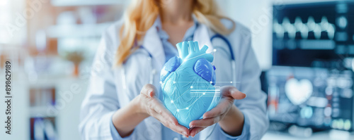 Hands of a doctor holding human heart. Health and cardiological diseases concept.