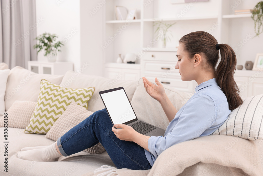 Sick woman having online consultation with doctor via laptop at home Sick woman having online consultation with doctor via laptop at home