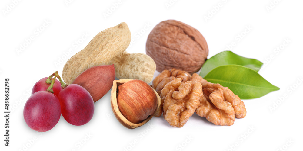 Mix of nuts and pink grapes isolated on white Mix of nuts and pink grapes isolated on white