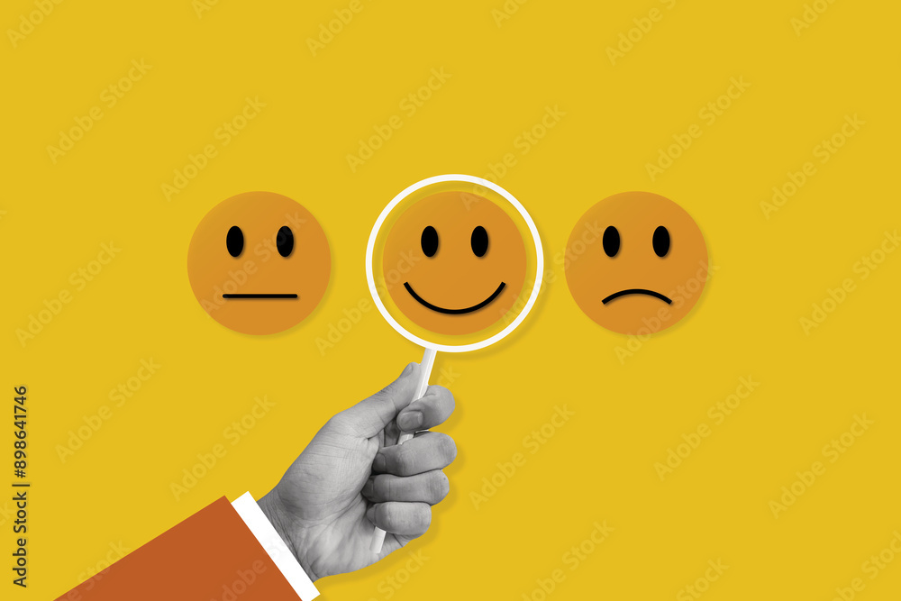 Art collage hand choosing happy smile face icon. feedback rating and positive customer review experience, satisfaction survey. mental health assessment. Art collage hand choosing happy smile face icon. feedback rating and positive customer review experience, satisfaction survey. mental health assessment.