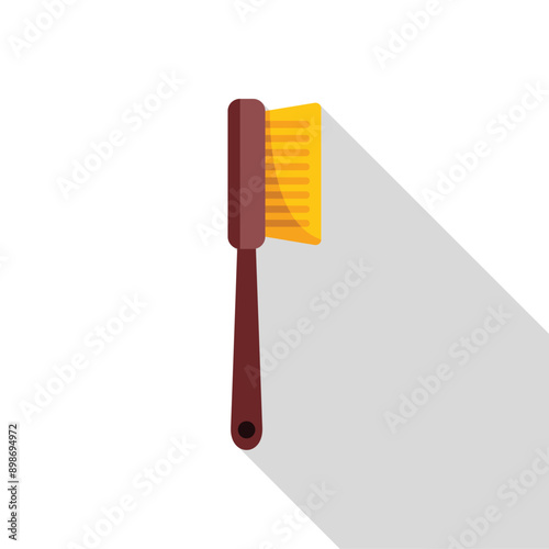 Cleaning brush with wooden handle casting long shadow on white background