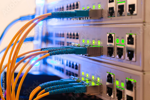 Fiber optic cables are connected to the switch interfaces. High speed concept