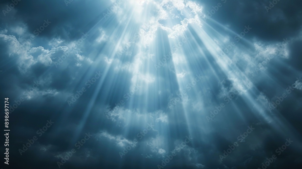 Fototapeta premium Sunbeams Through Dramatic Clouds