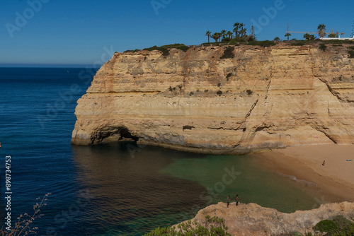 Coastline and Benegil Caves as seen from the Seven Hanging Valleys Trail, this trail encompasses the coastline between Marinha Beach and Vale Centeanes Beach, Lagoa municipality, Algarve, Portugal.
