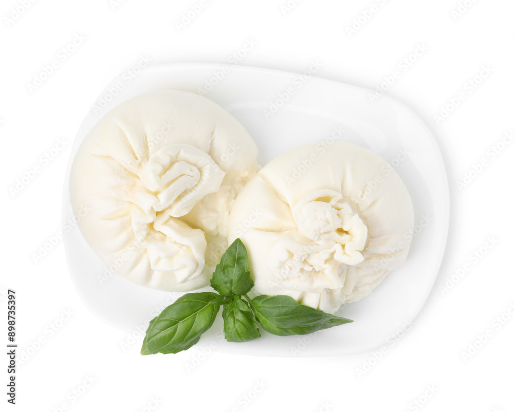 Delicious burrata cheese and basil isolated on white, top view Delicious burrata cheese and basil isolated on white, top view