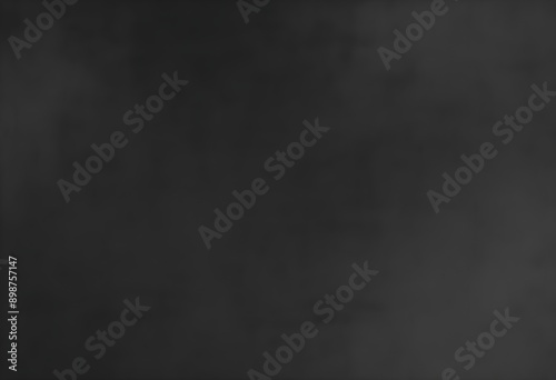 Dark grey velvet texture sample, gray satin screen  background, smooth, some waves, well enlighted photo