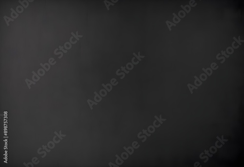 Dark grey velvet texture sample, gray satin screen  background, smooth, some waves, well enlighted photo