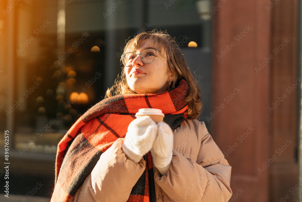 Woman Holding Cup of Coffee in Winter on Sunny Day Woman Holding Cup of Coffee in Winter on Sunny Day