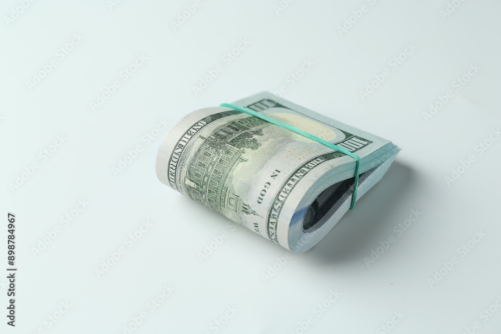 Bundle of dollar banknotes on white background