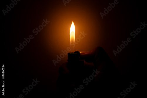 Man's hand with lighter