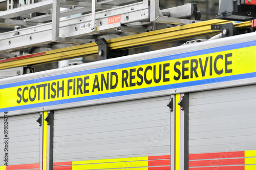 View of a logo for the Scottish Fire and Rescue Service (Scotland, UK) on the side of a fire engine. Was taken during an incident in Glasgow. photo