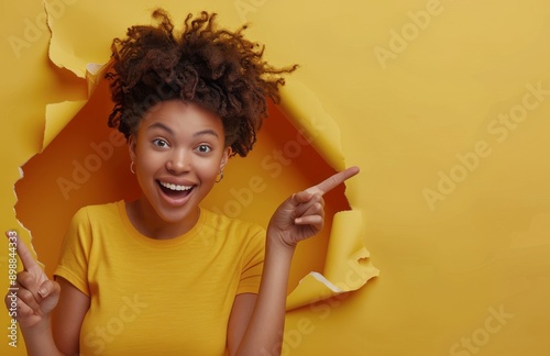 Portrait of a Smiling Young Woman With Brown Hair and a Denim Shirt