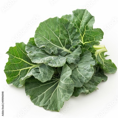 a bunch of green leafy vegetables on a white surface