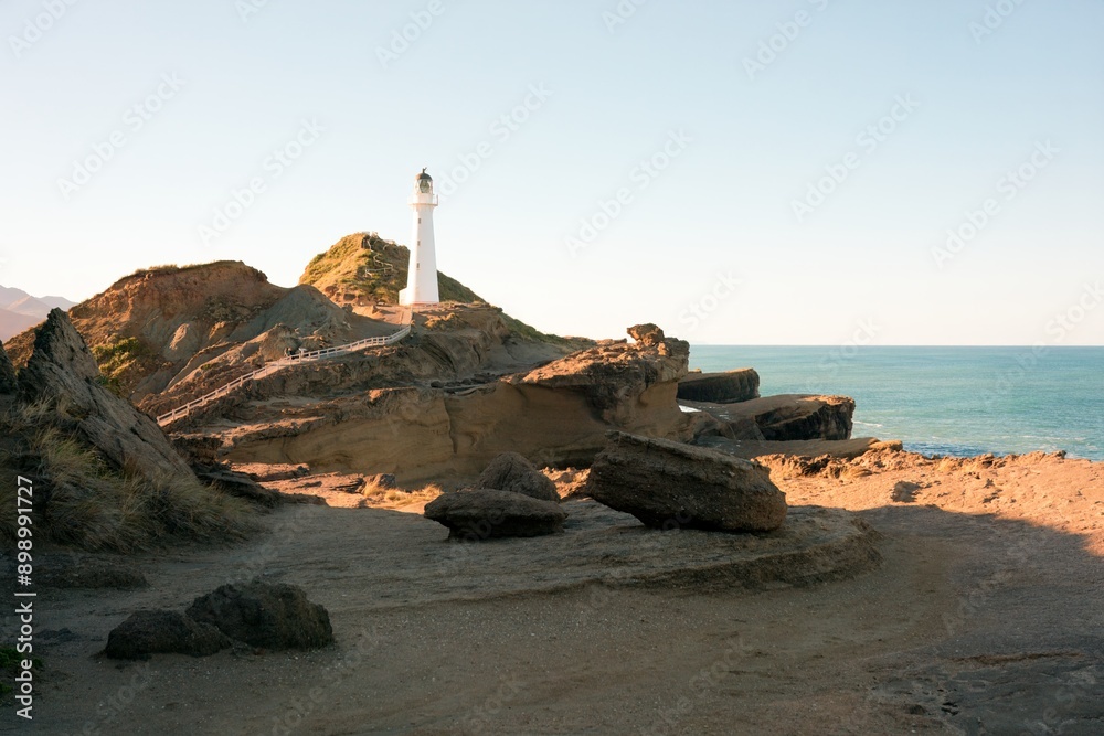 The Castlepoint reef and the Castlepoint Lighthouse The Castlepoint reef and the Castlepoint Lighthouse