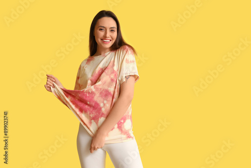 Stylish young woman in tie-...