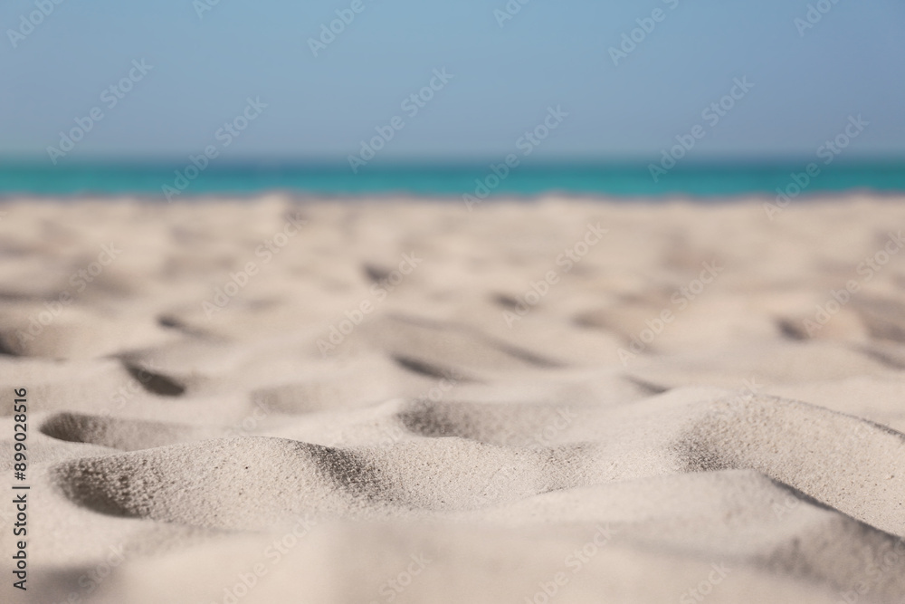 Beautiful sandy beach and sea on sunny day. Summer vacation Beautiful sandy beach and sea on sunny day. Summer vacation