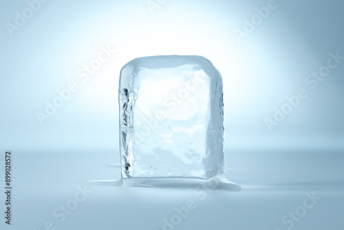 Cube of clear ice on light blue background