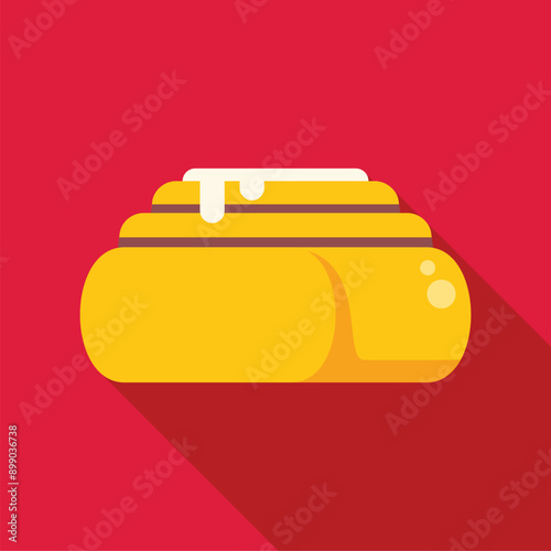 Delicious cinnamon roll drizzled with white icing on a vibrant red background