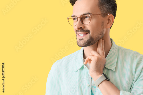 Young man checking his puls...