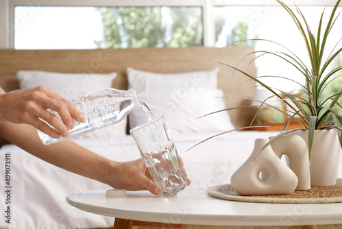 Bottle of water in bedroom