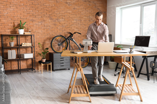 Young businessman working w...