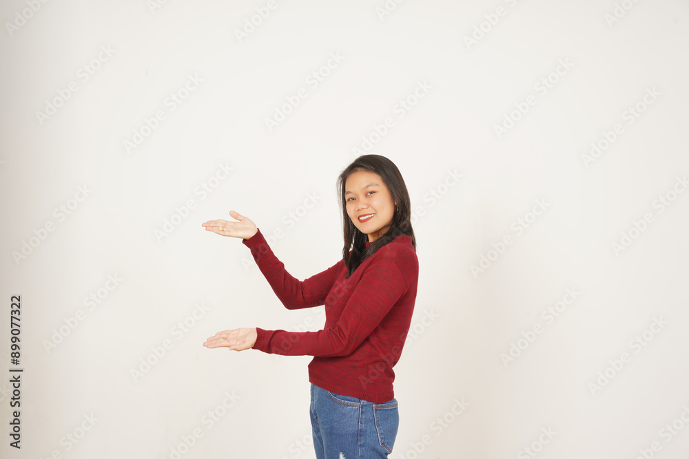 Young Asian woman presenting with two hand wearing red t-shirt isolated on white background Young Asian woman presenting with two hand wearing red t-shirt isolated on white background