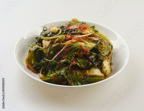 Close-up of Bomdong Geot-jeori(Fresh Cabbage Kimchi) with wild chive on a dish, South Korea 