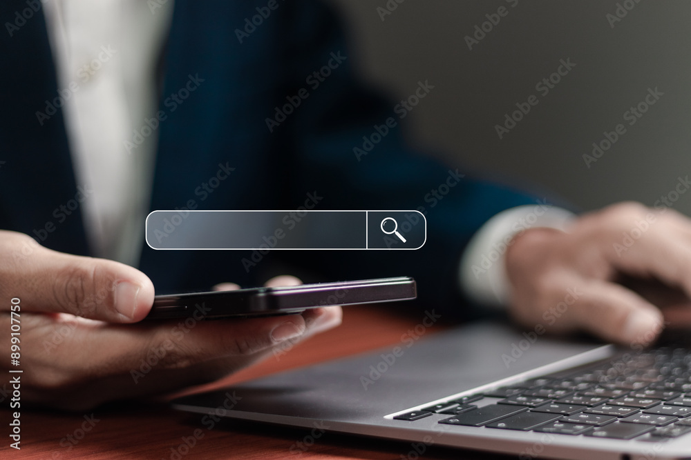 SEO search engine optimization concept. Businessman working with search bar on virtual screen. Marketing ranking traffic website, internet technology for business company.