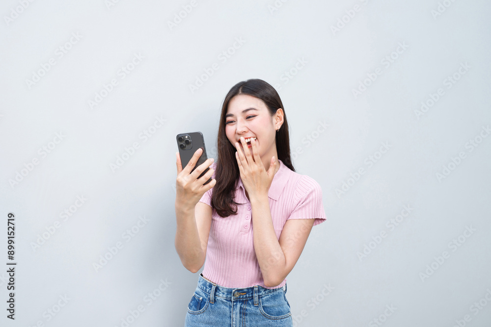 Model asian woman emotion happy and excited to win prizes with online lottery tickets on their mobile phones. Model asian woman emotion happy and excited to win prizes with online lottery tickets on their mobile phones.