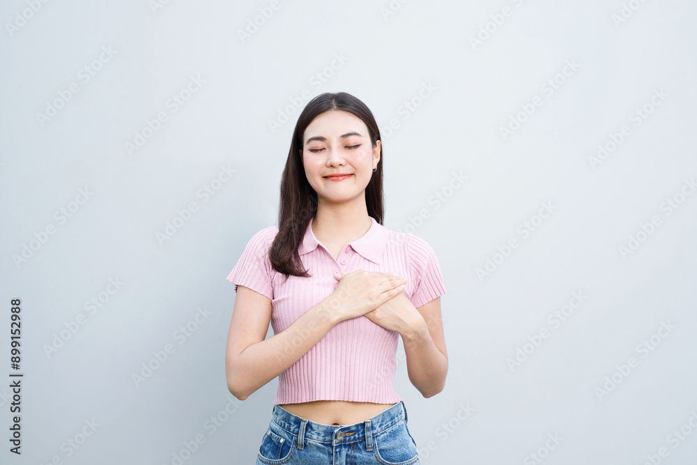 A woman smiles happily after winning a special prize. A woman smiles happily after winning a special prize.