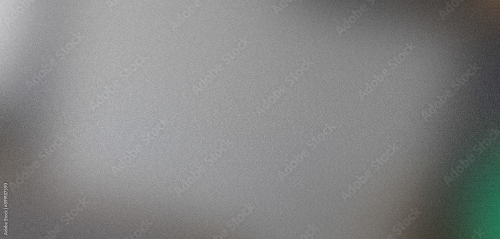 Obraz premium Grainy textured surface of gray silver metallic background