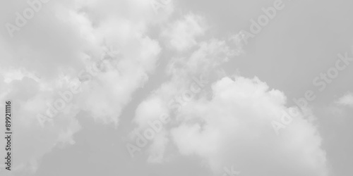 White cloud in the sky. View on a soft white fluffy cloud as background. Cloudy sky, white clouds, black background pattern. The gray cloud trendy photo. 