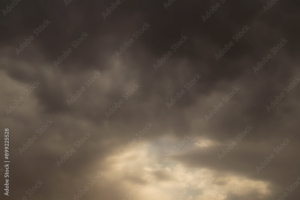 photo of storm clouds with a space through which the sky and light filter through, photo of storm clouds with a space through which the sky and light filter through,