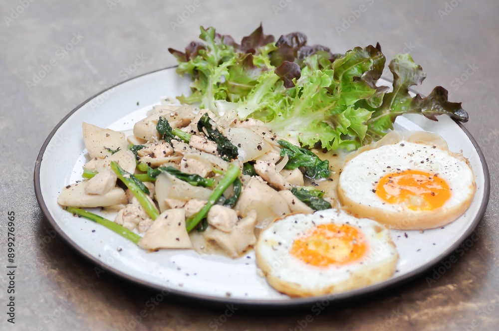 stir-fried chicken with mushroom and kale , sunny side up egg and lettuce stir-fried chicken with mushroom and kale , sunny side up egg and lettuce