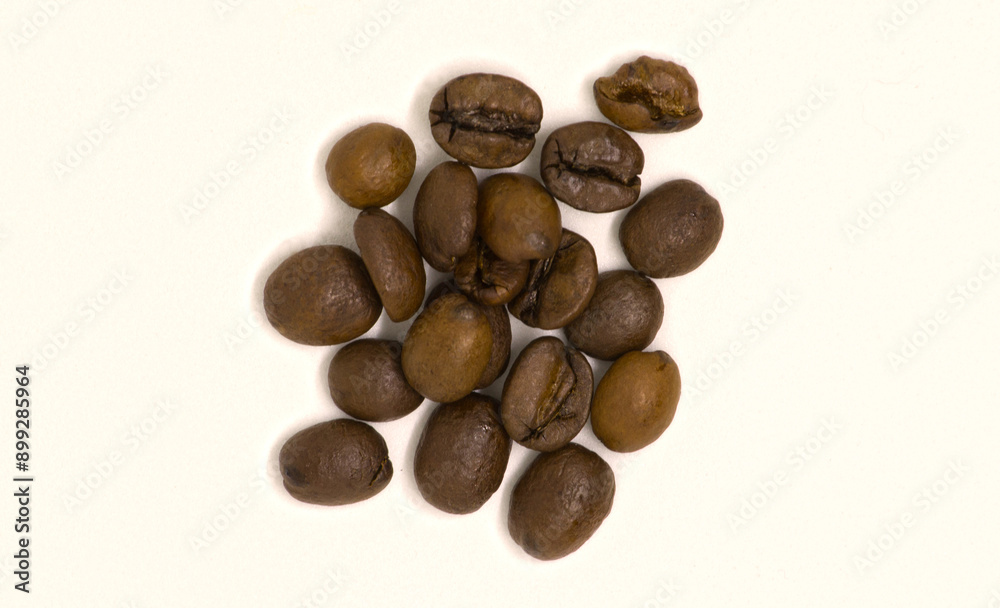 Naklejka premium coffee beans on white background