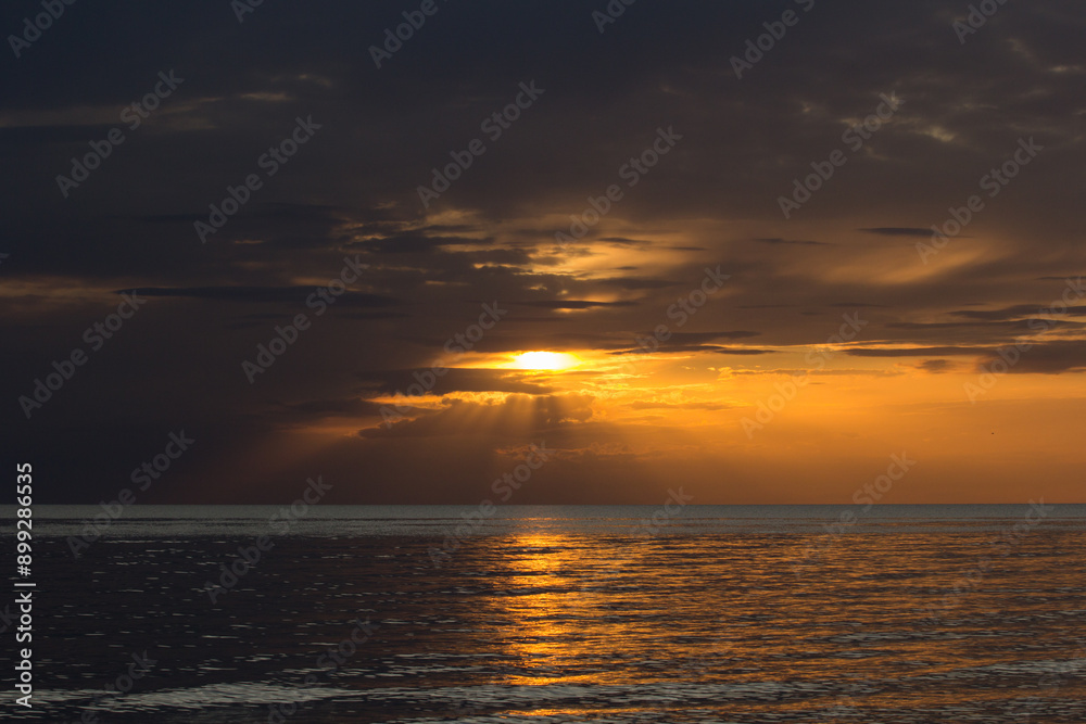 Fototapeta premium sunset on summer evening at sea