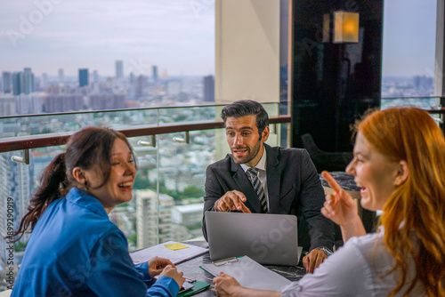 White collar worker meeting at high rise tower.