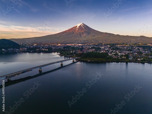 Drone footage of Mount Fuji and Kawaguchiko Lake at down, Japan photo