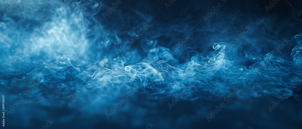 A lot of blue smoke against a black backdrop, with a blurred bottom portion of the smoke and the very bottom of it being blue A lot of blue smoke against a black backdrop, with a blurred bottom portion of the smoke and the very bottom of it being blue