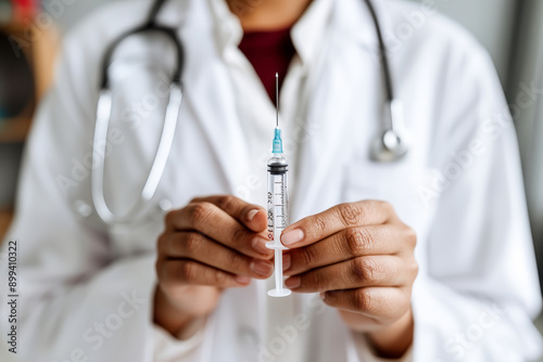 Healthcare Professional Preparing Injection Close-up of a doctor holding a syringe and vial emphasizing medical care vaccination and patient health in a clinical setting Background Wallpaper