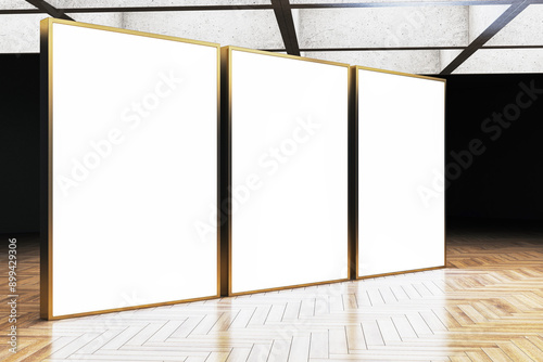 Blank white canvases in a gallery exhibition room. 3D Rendering photo