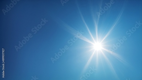 Azure Radiance: Sunbeams pierce the vibrant blue sky, radiating warmth and brilliance. 