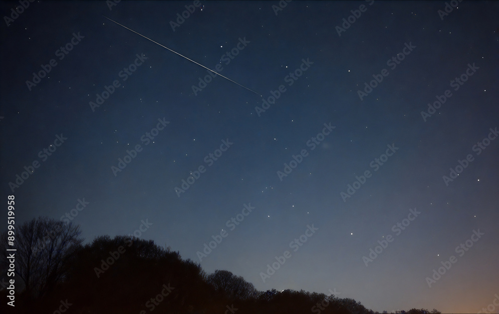 Starry night sky over a mountain view